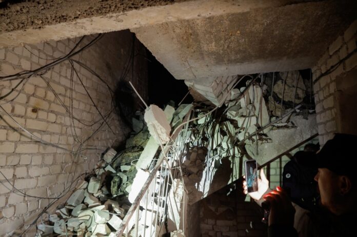 Debris from fallen Russian drone damages residential building in Kyiv