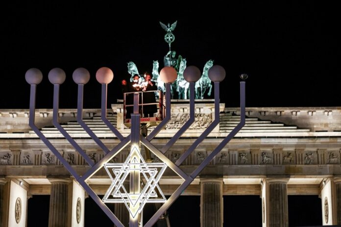 Lighting of Hanukkah Candle at Brandenburg Gate in Berlin