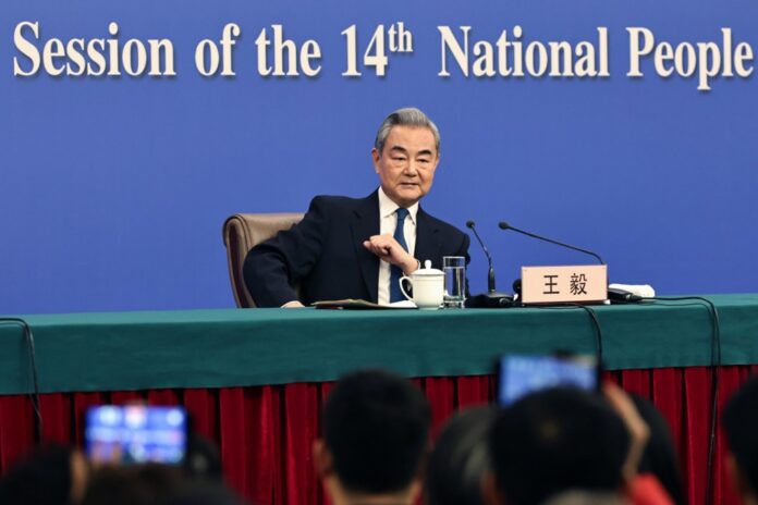 Chinese Foreign Minister Wang Yi holds press conference at Fourth Session of 14th National People's Congress