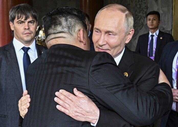 Russian President Vladimir Putin and North Korean leader Kim Jong Un meet in Beijing