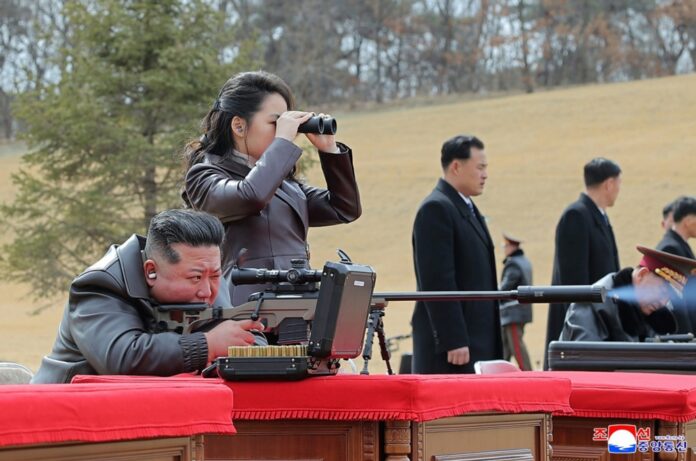 North Korea leader and daughter firing new sniper rifle