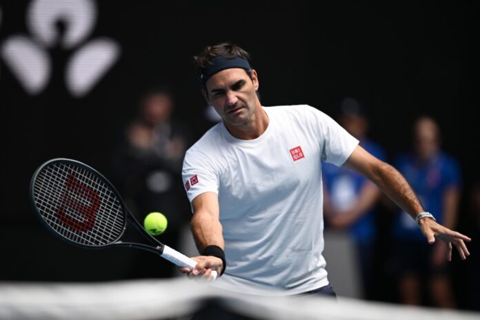 Former champion Roger Federer trains with Norway's Casper Ruud ahead of Australian Open
