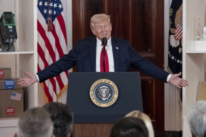 US President Trump delivers remarks during an 'Investing in America' event at the White House