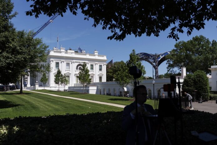 Construction of a UFC Octagon continues at the White House