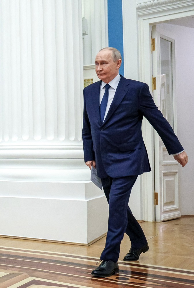 Russian President Putin presents state awards to defense industry workers at Kremlin