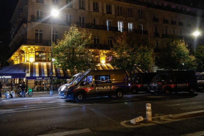 Police clash with protesters during second day of high cost-of-living protests in Paris